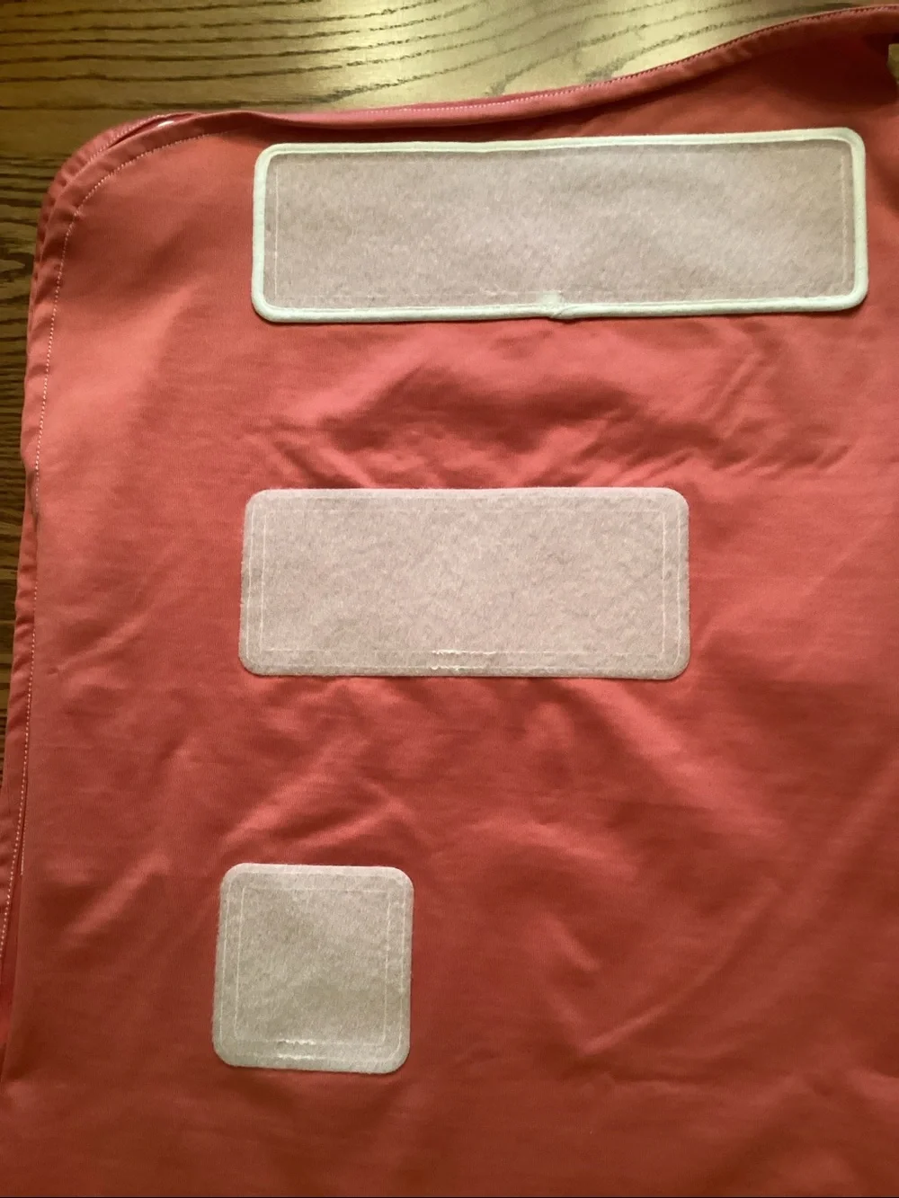 Ollie coral swaddle